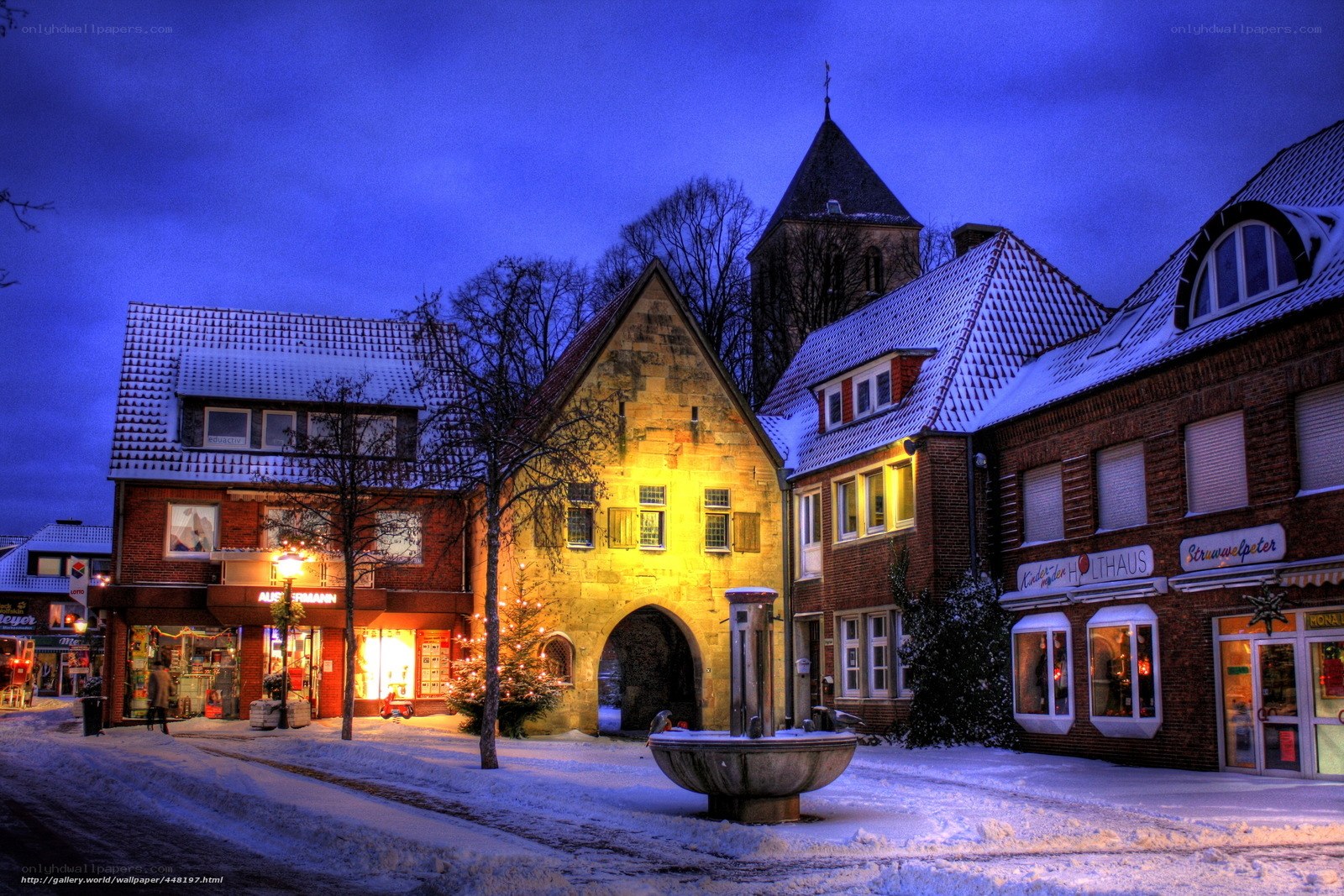 Snowy town square at dusk