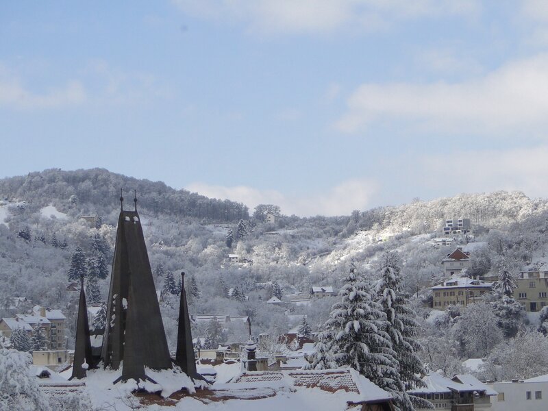 Snowy town with church spires