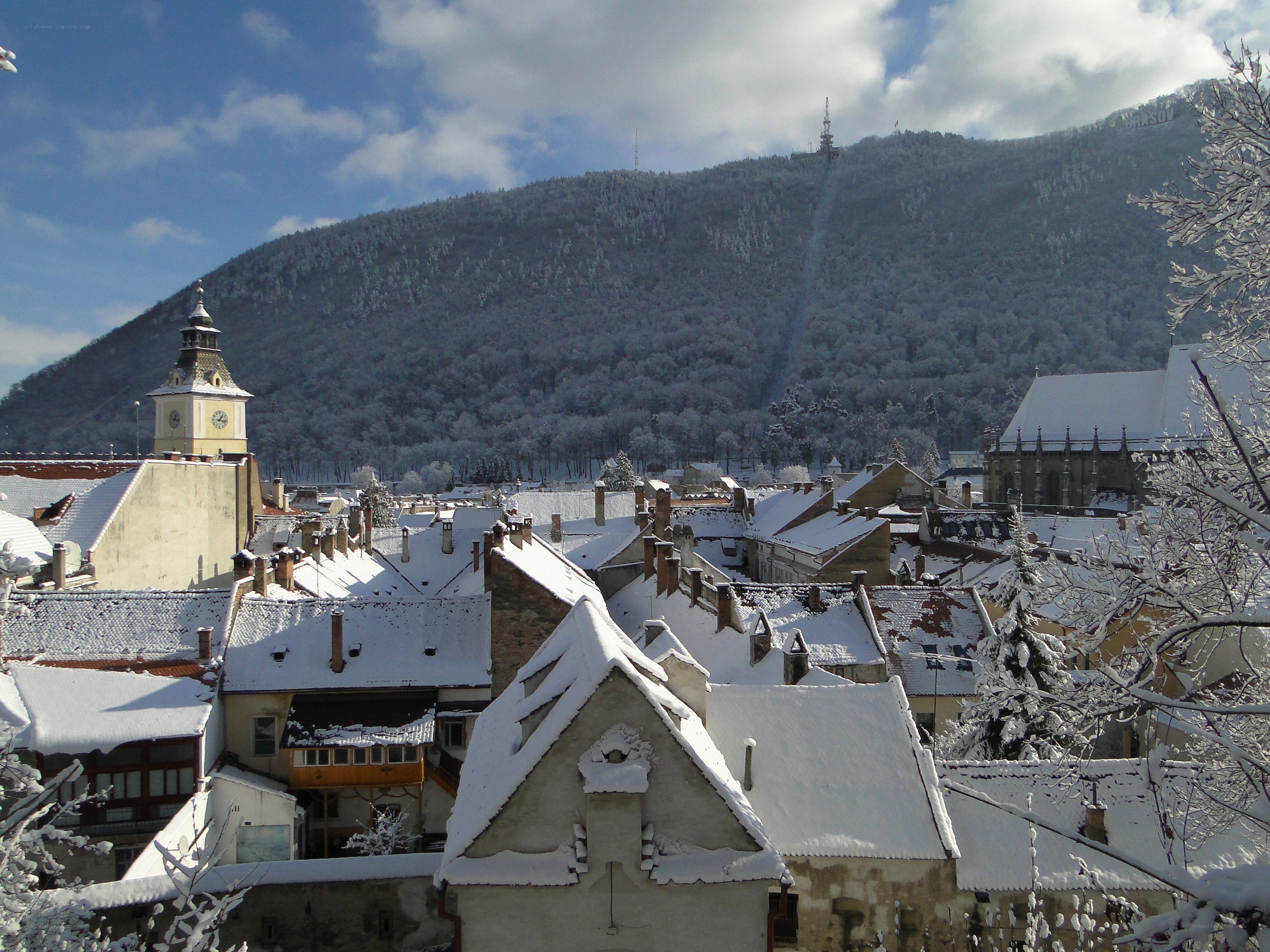 Snowy town with mountain view