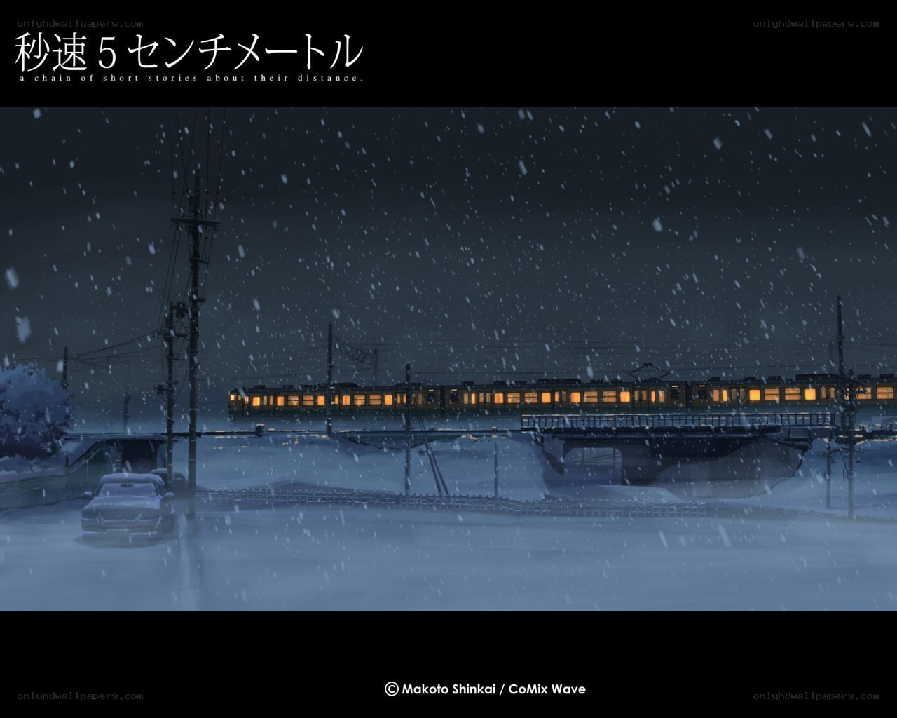 Snowy train at night