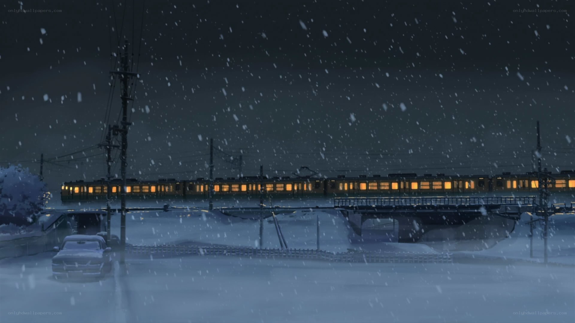 Snowy train at night