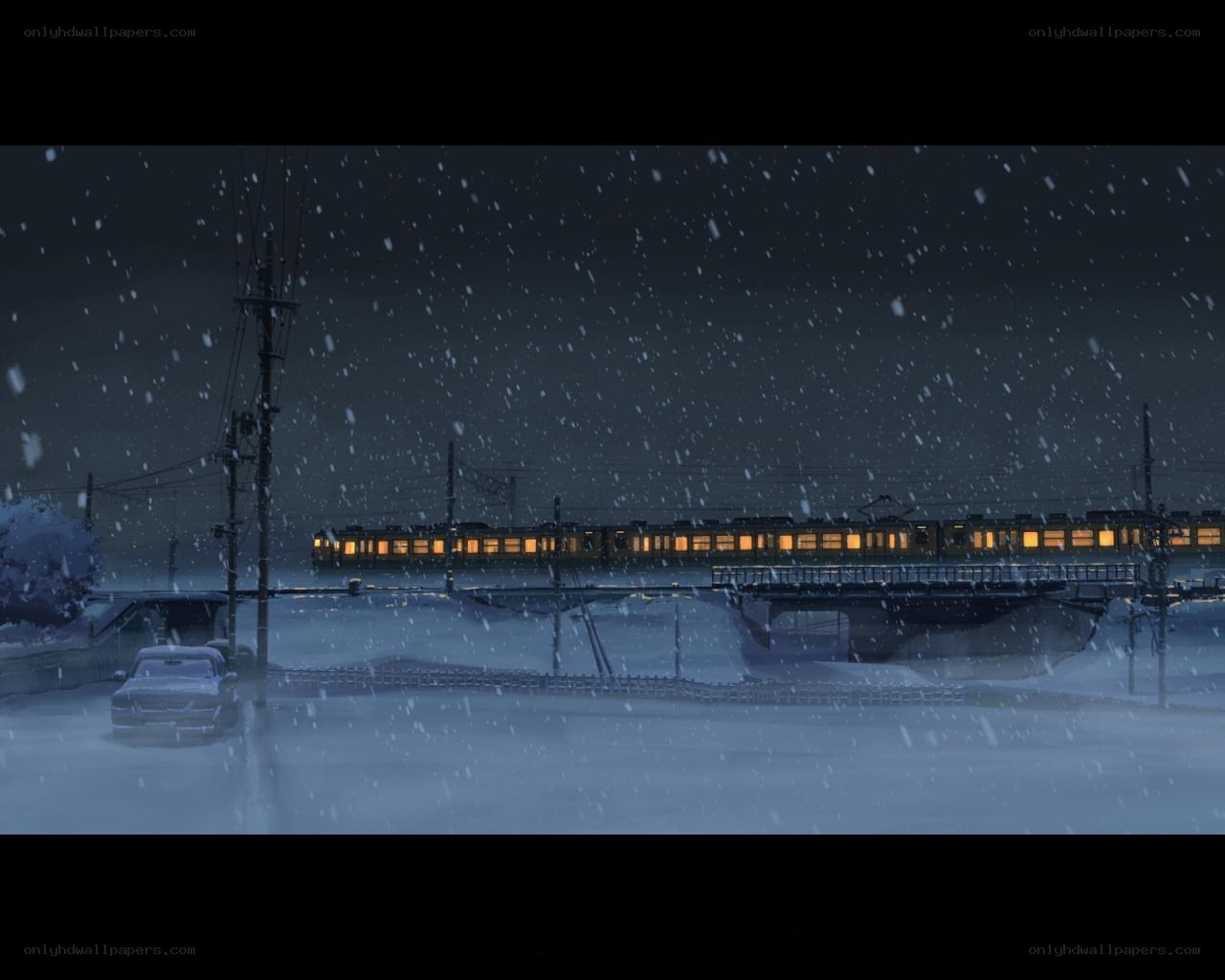 Snowy train at night