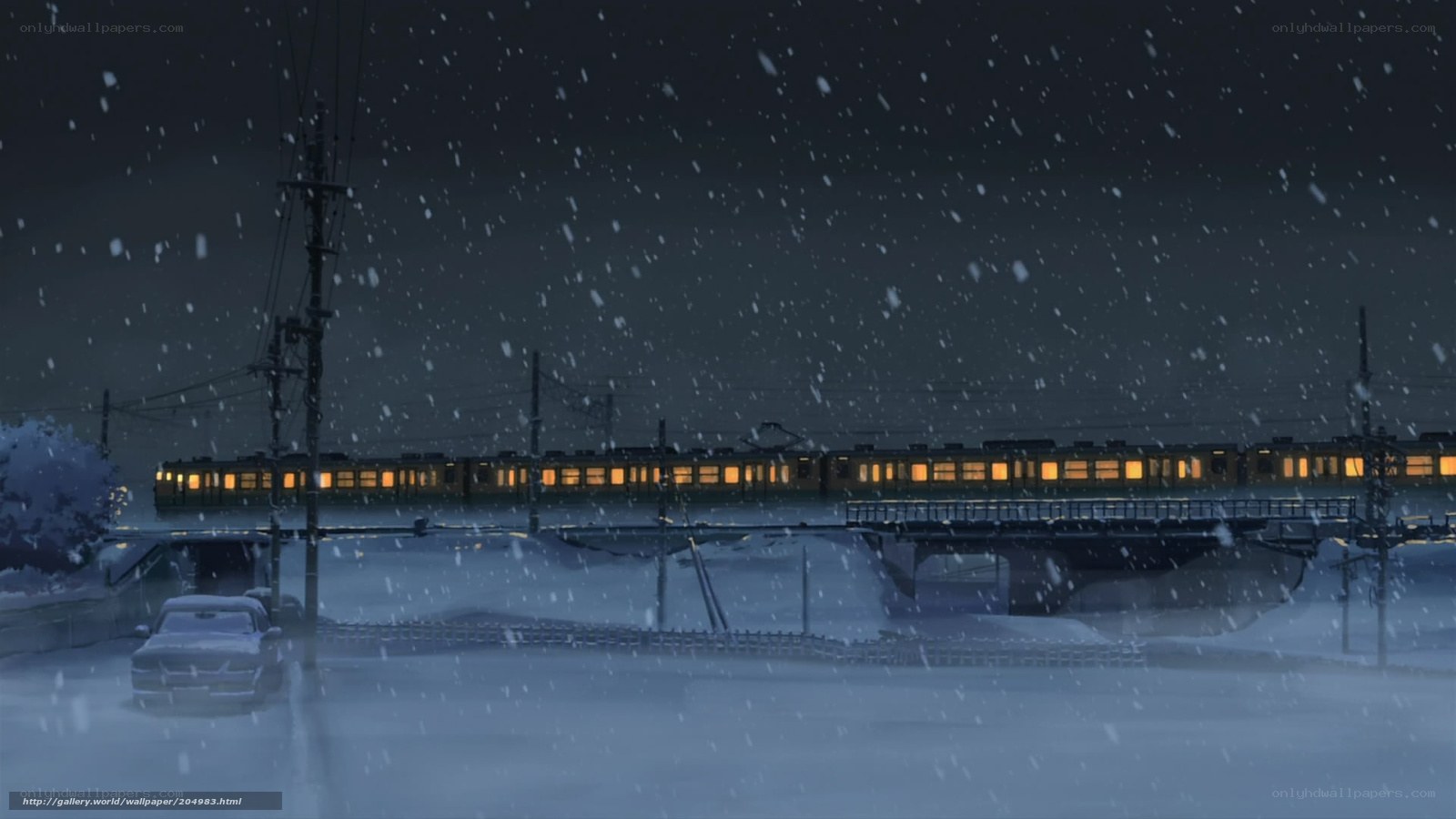 Snowy train at night