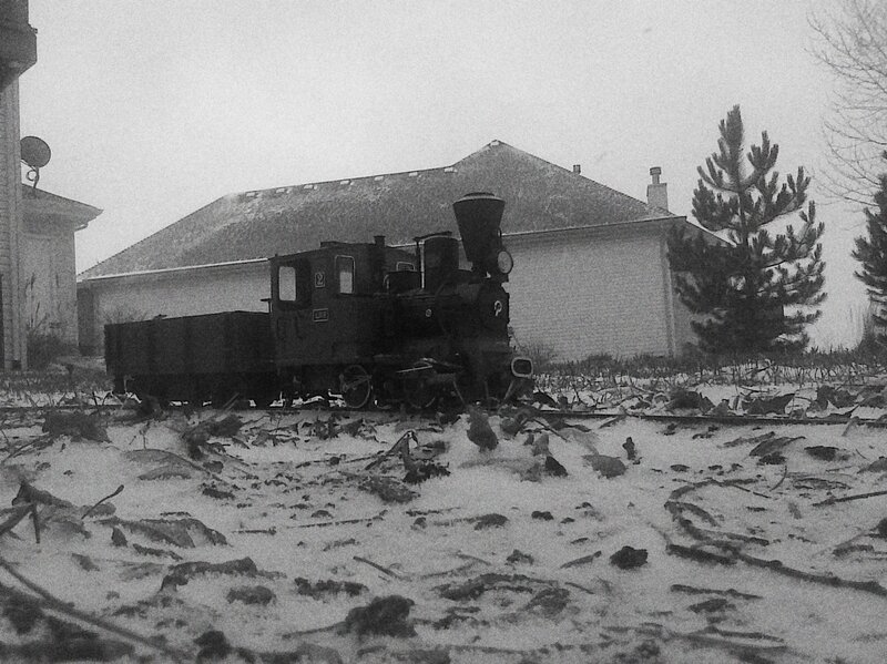 Snowy train in yard
