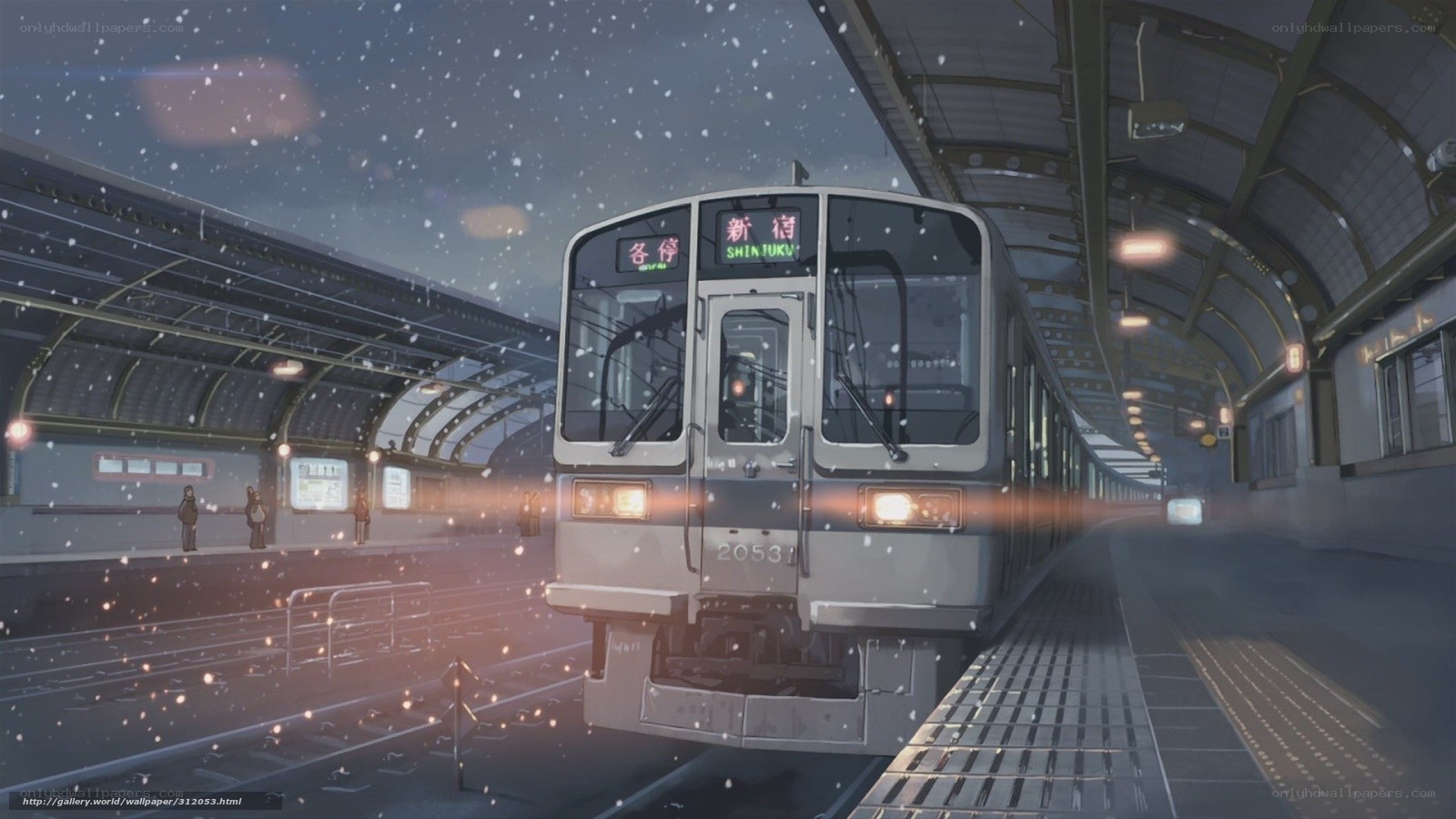 Snowy train station at dusk