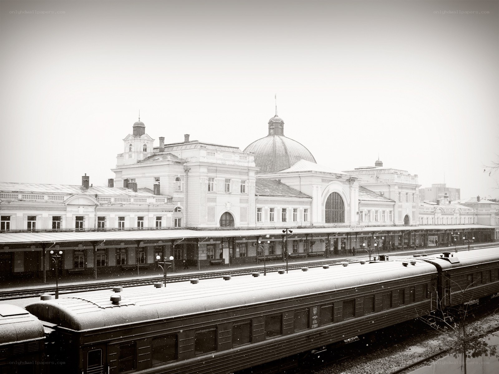 Snowy train station scene