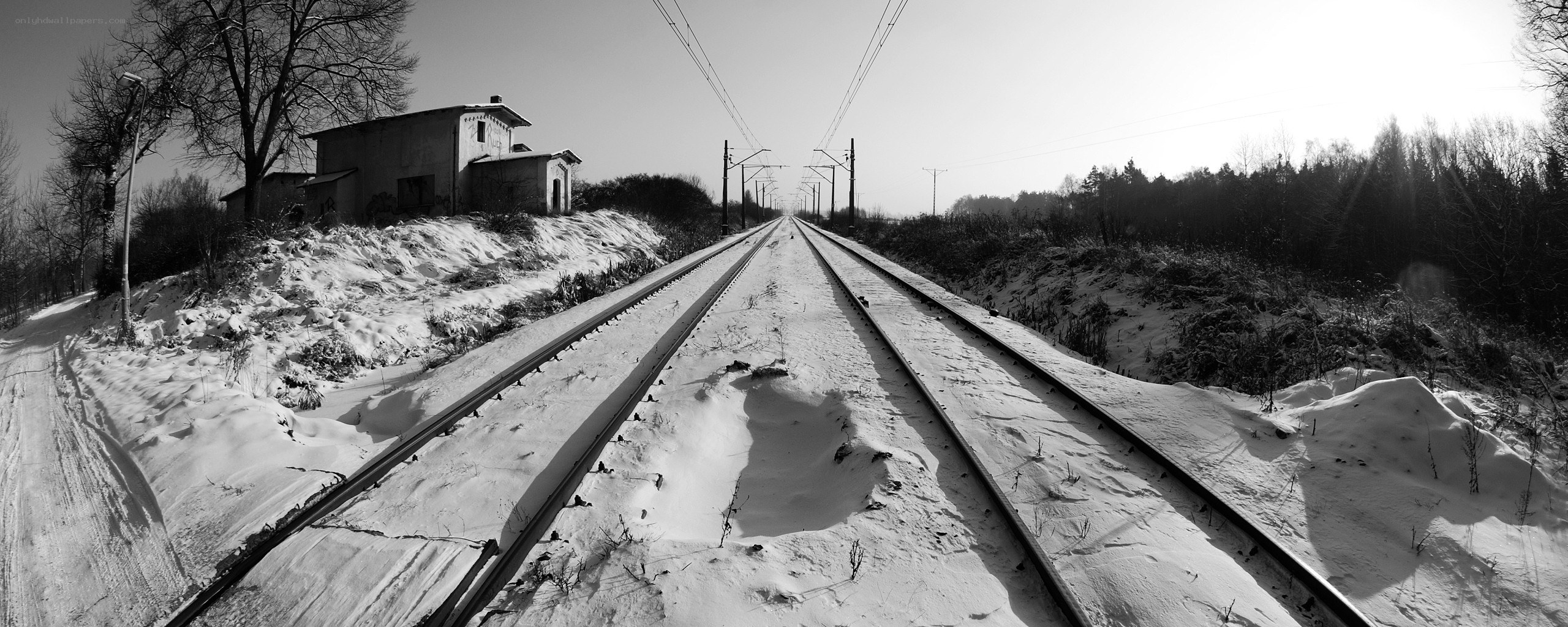 Snowy train tracks in winter