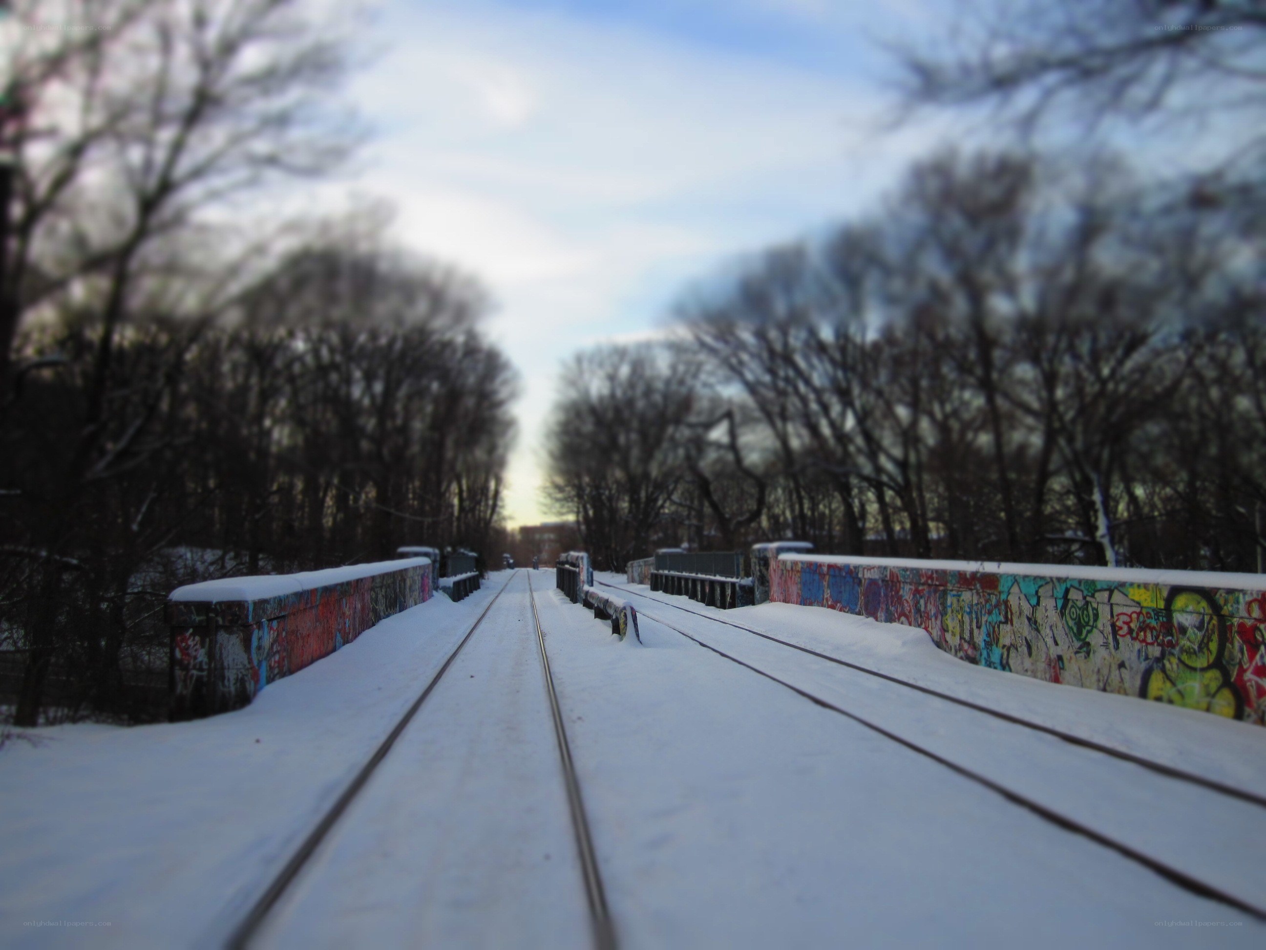 snowy train tracks in winter