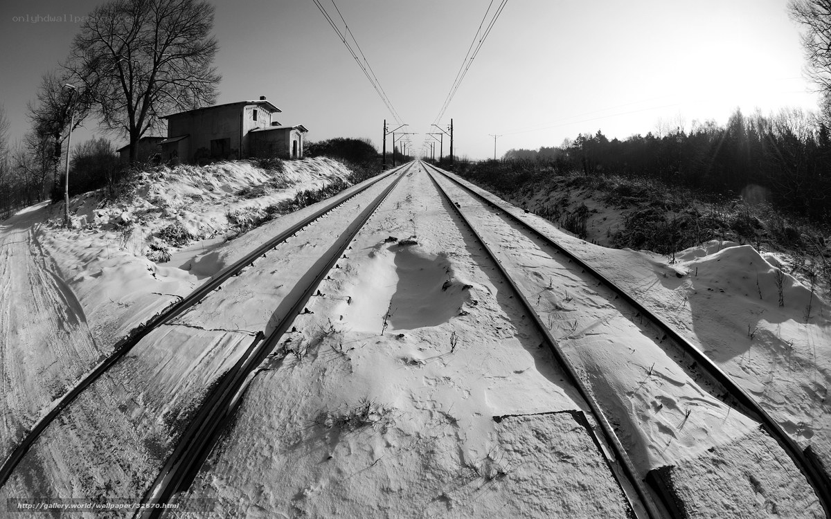 Snowy train tracks in winter