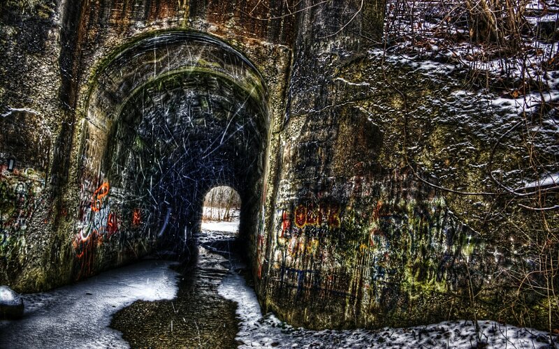 Snowy tunnel with graffiti