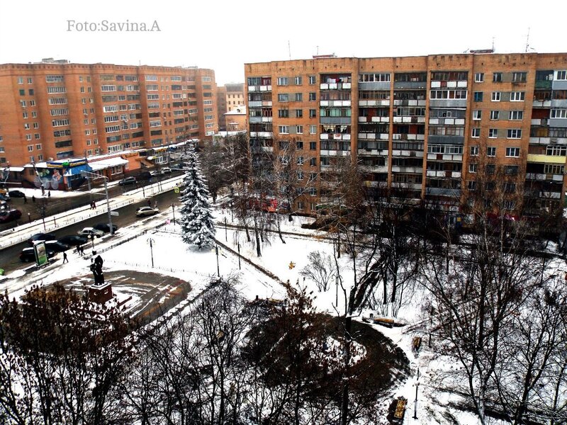 Snowy urban apartment complex