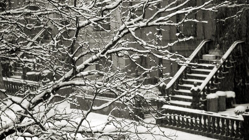Snowy urban scene with stairs