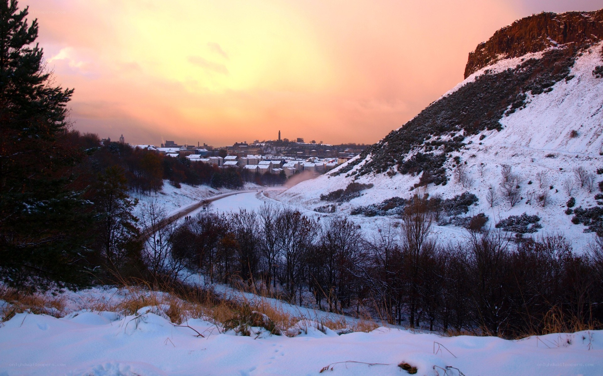 Snowy valley at sunset