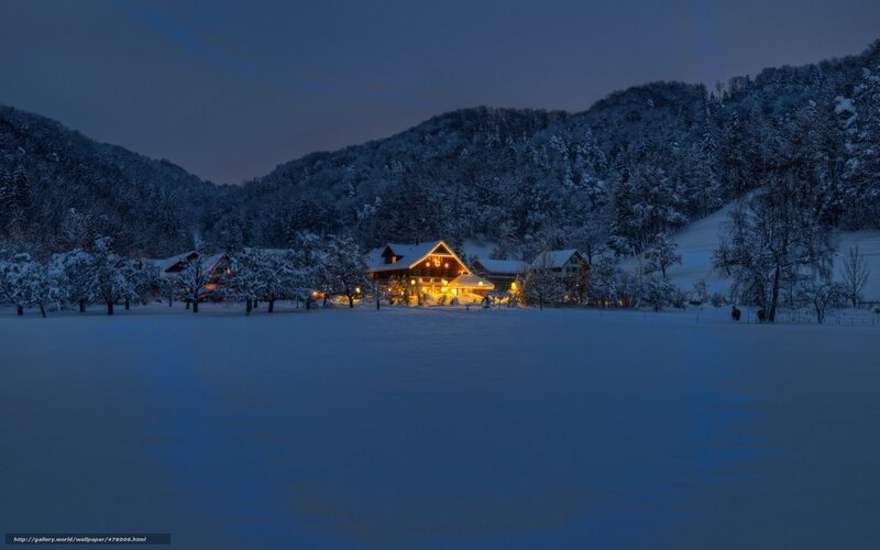 Snowy village at dusk
