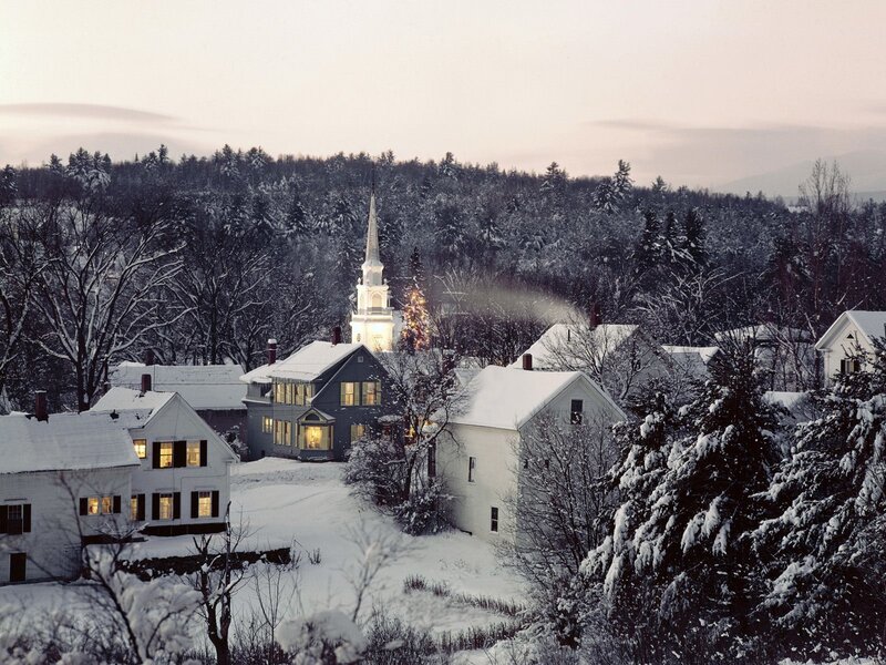 Snowy village at dusk