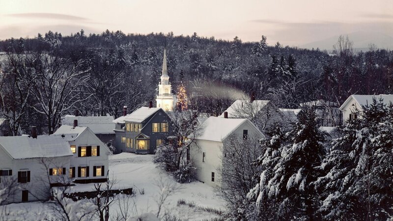 Snowy village at dusk