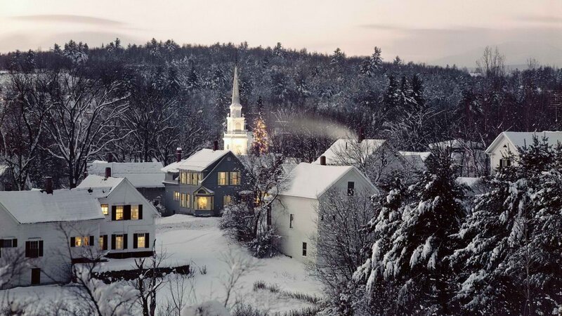 Snowy village at dusk