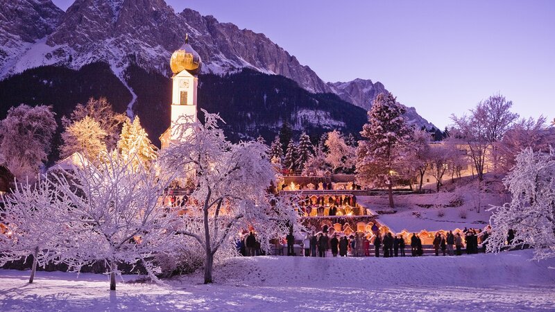 Snowy village at dusk