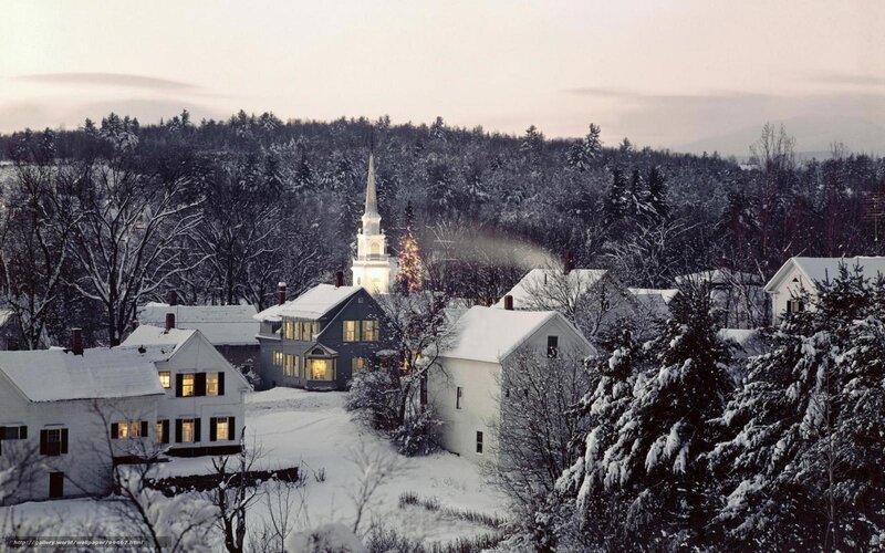 Snowy village at dusk