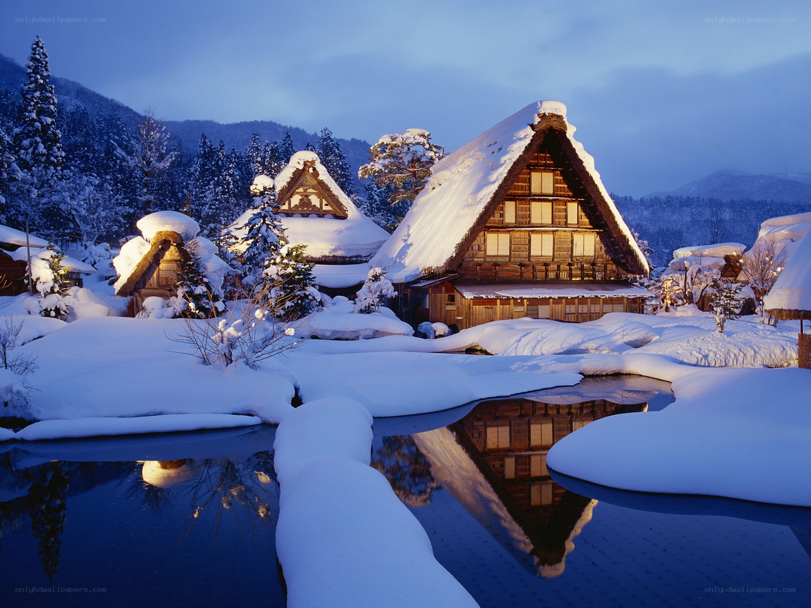 Snowy village at dusk