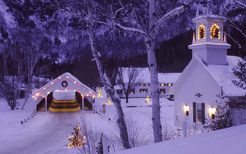 Snowy village at dusk