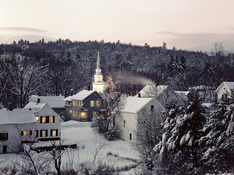 Snowy village at dusk
