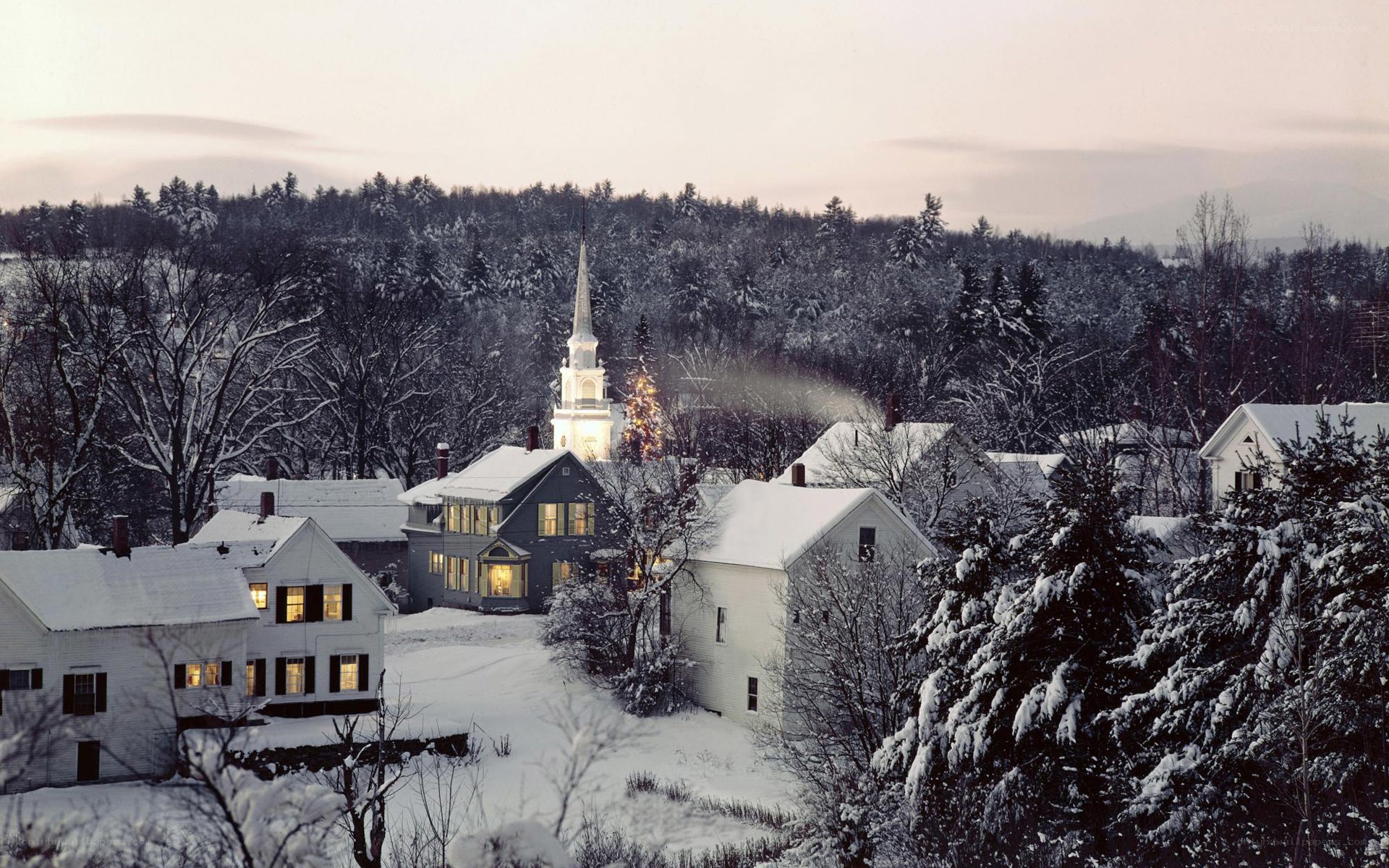 Snowy village at dusk