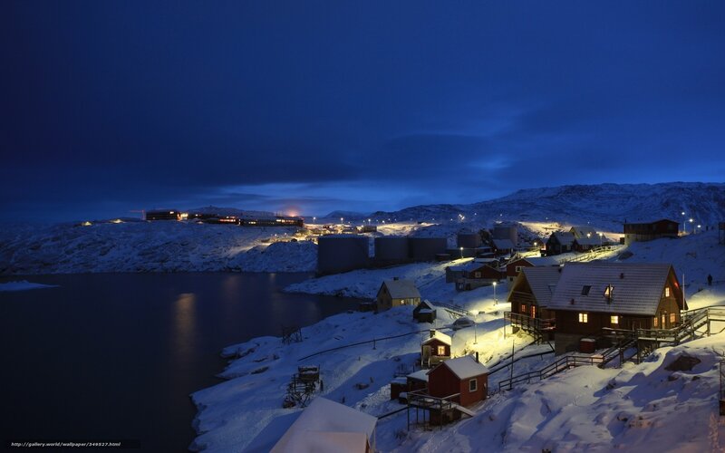 Snowy village at dusk