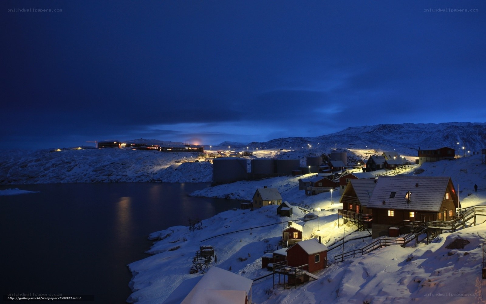 Snowy village at dusk