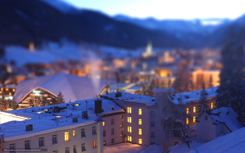 Snowy village at dusk