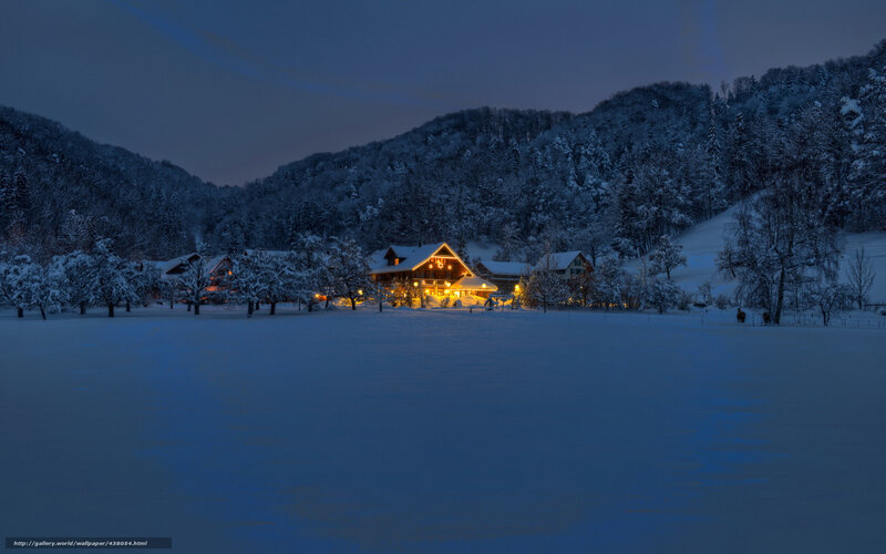 Snowy village at dusk