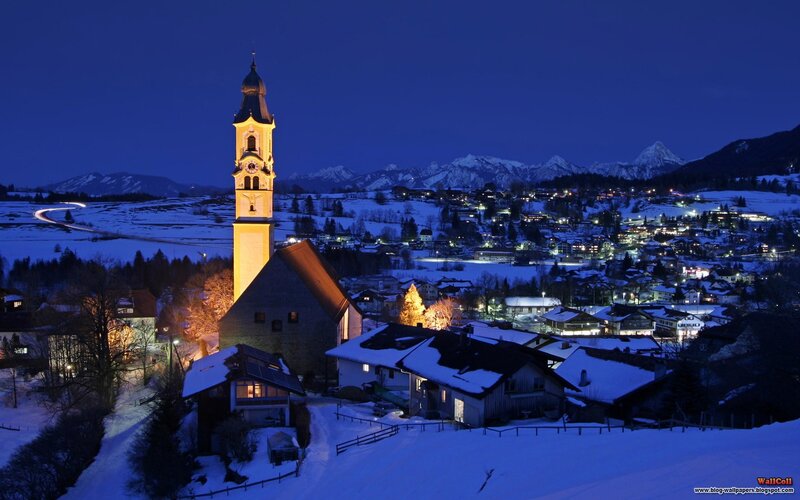 snowy village at night