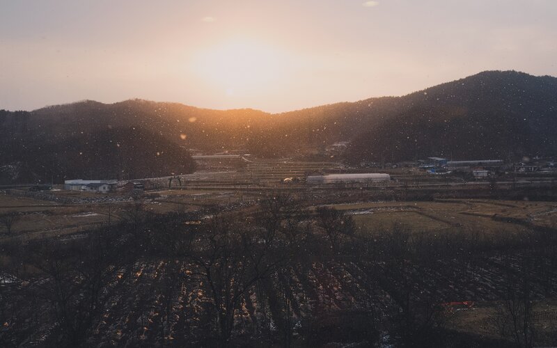 Snowy Village at Sunset — Orange, Serene, Photograph