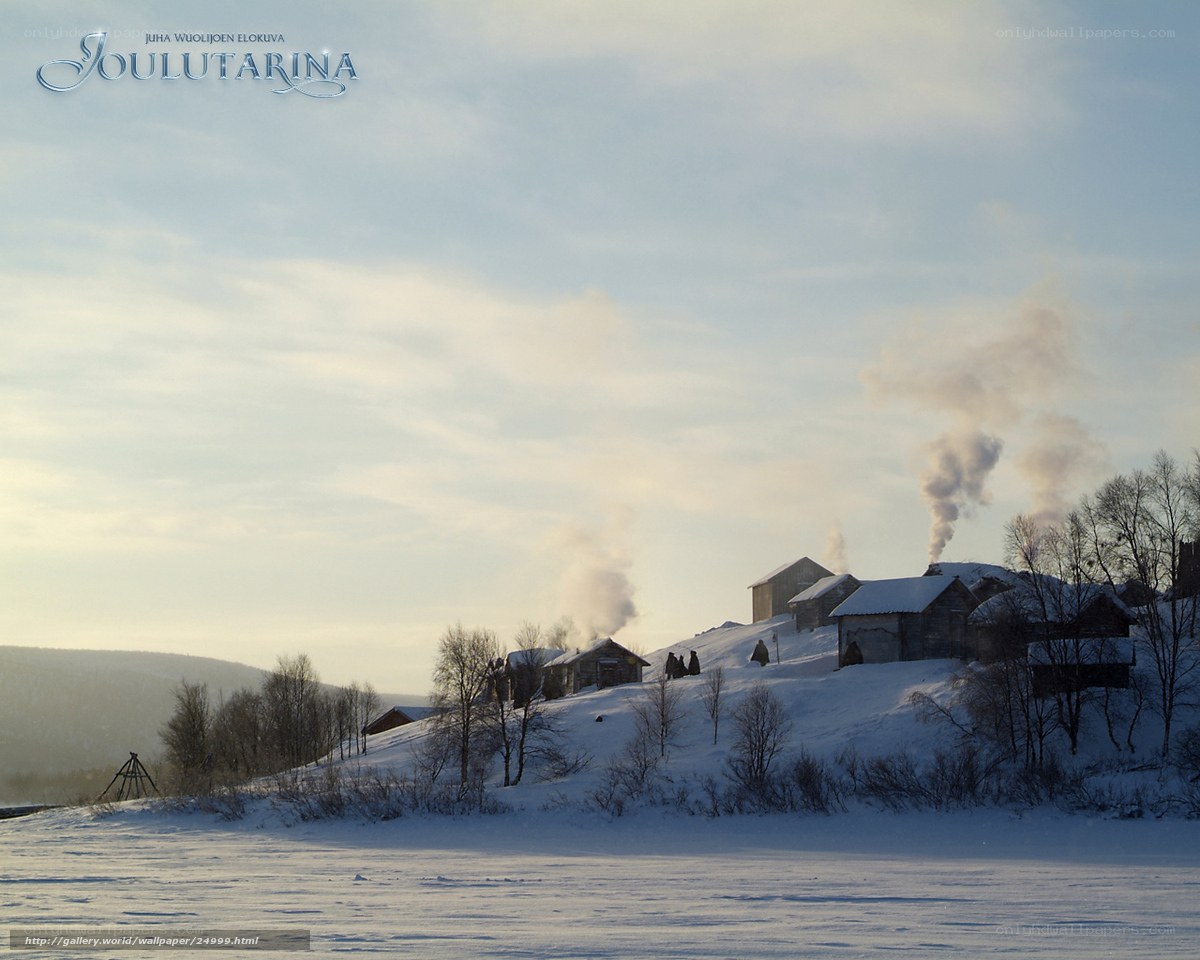 Snowy village at sunset