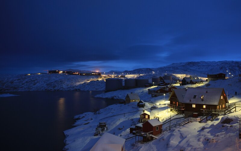 Snowy village at twilight