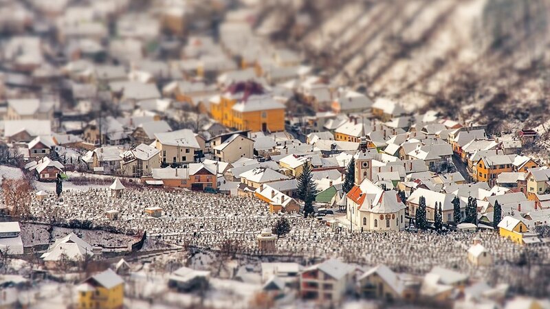 Snowy village in tilt-shift