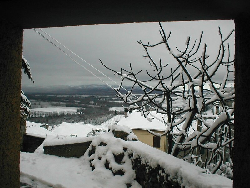 Snowy village view from window