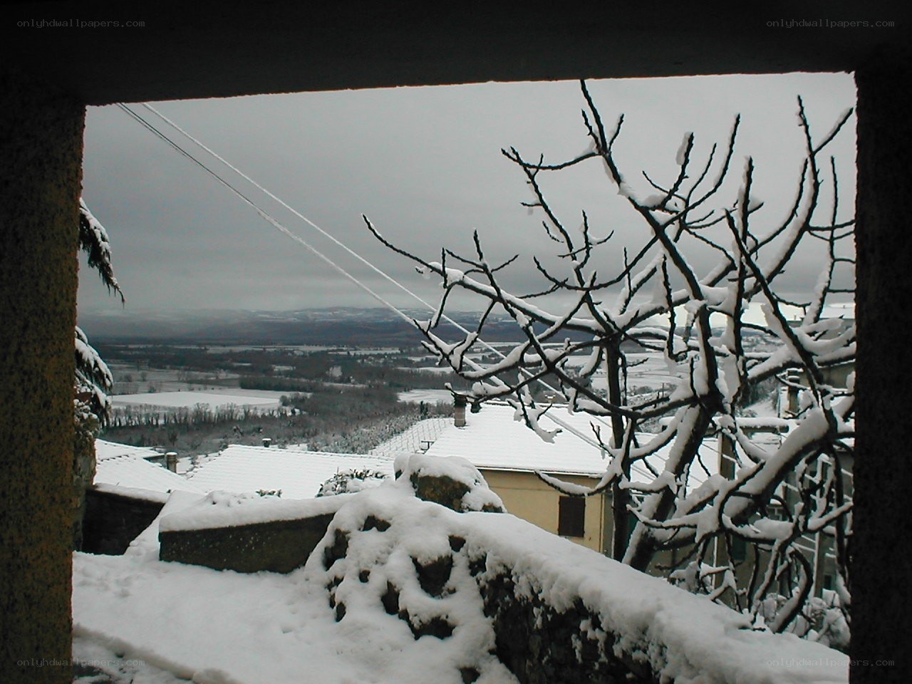 Snowy village view from window