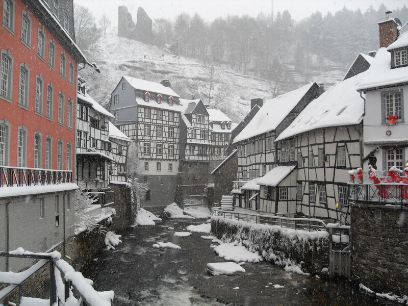 snowy village with half-timbered houses