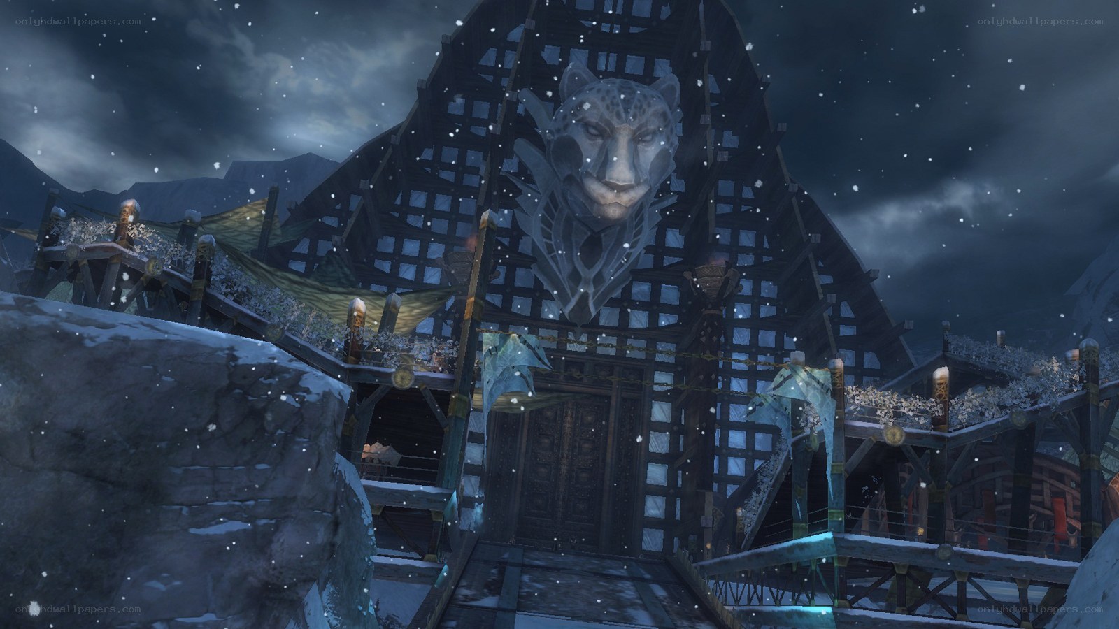 snowy village with leopard statue