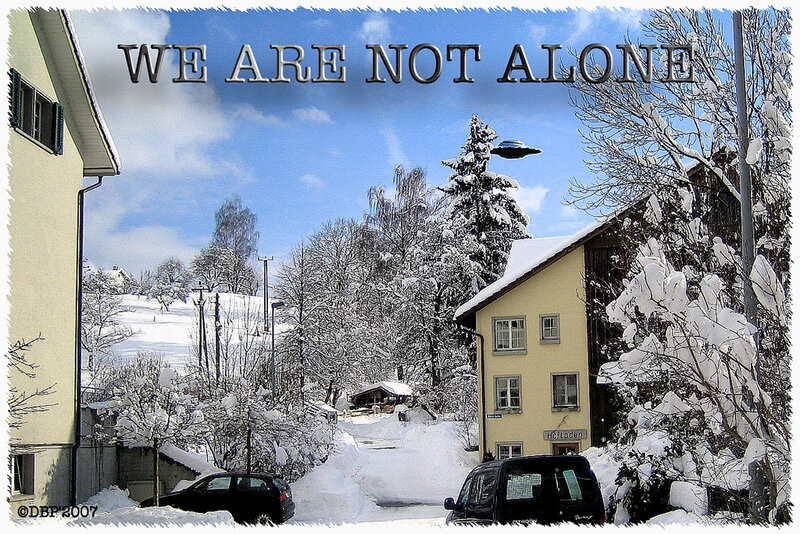 Snowy village with UFO