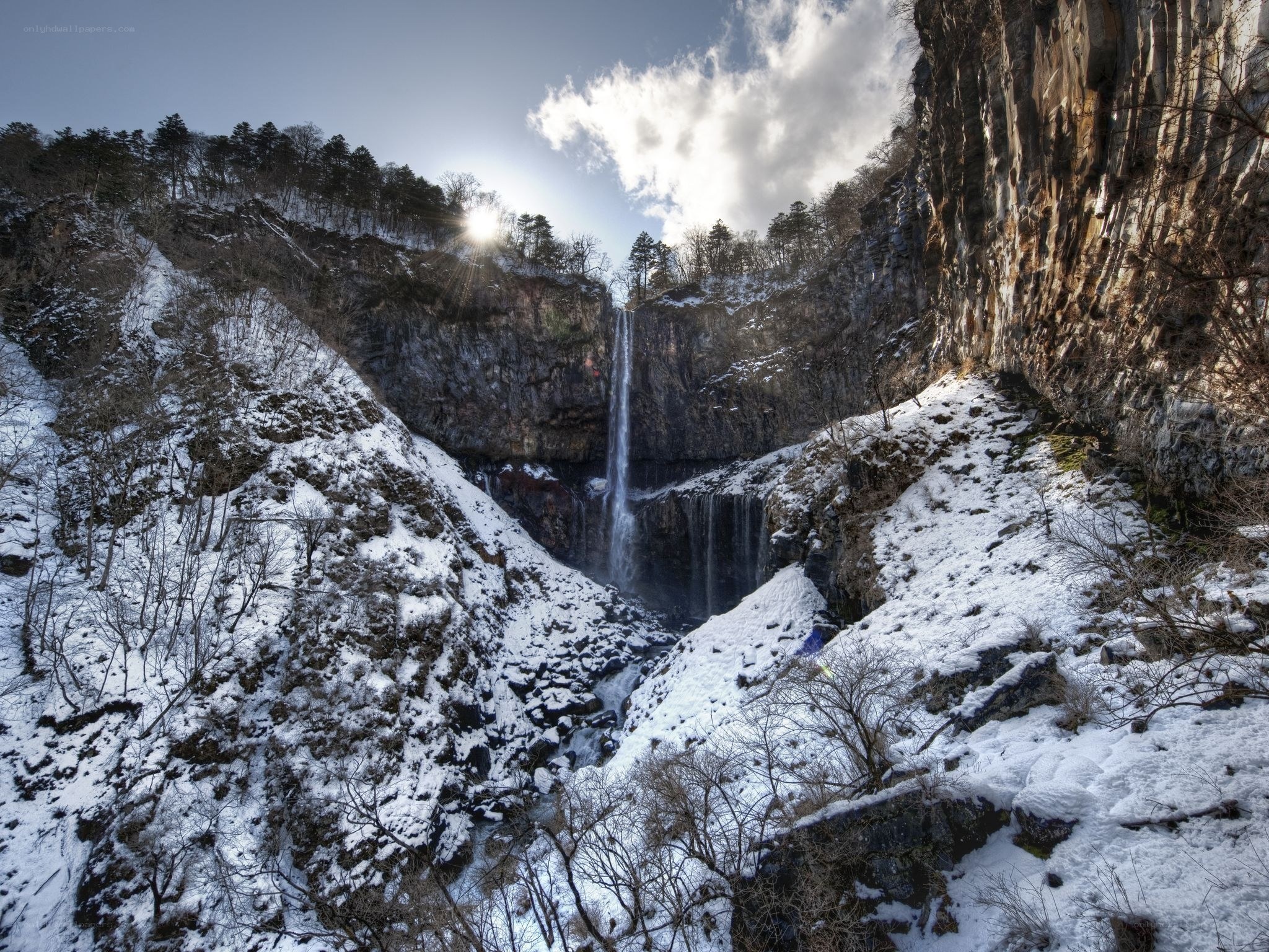 Snowy waterfall in a canyon