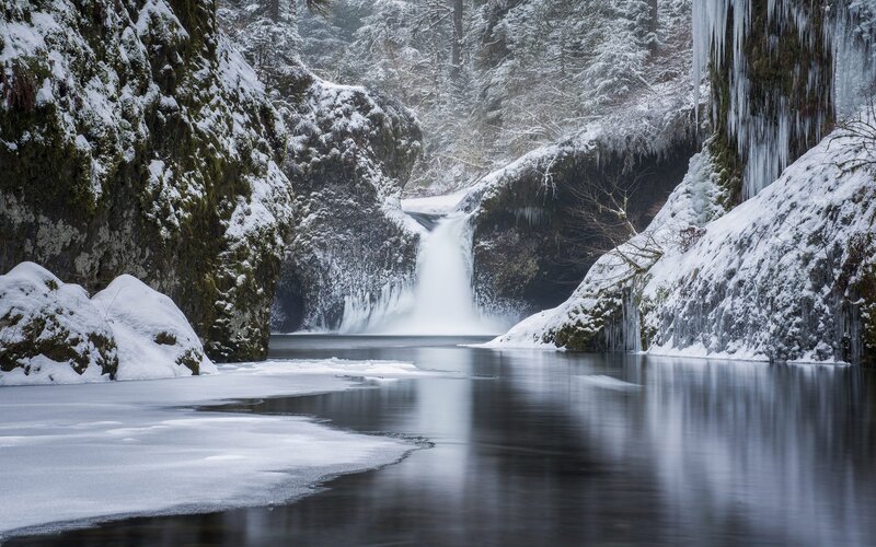 Snowy Waterfall in Canyon
