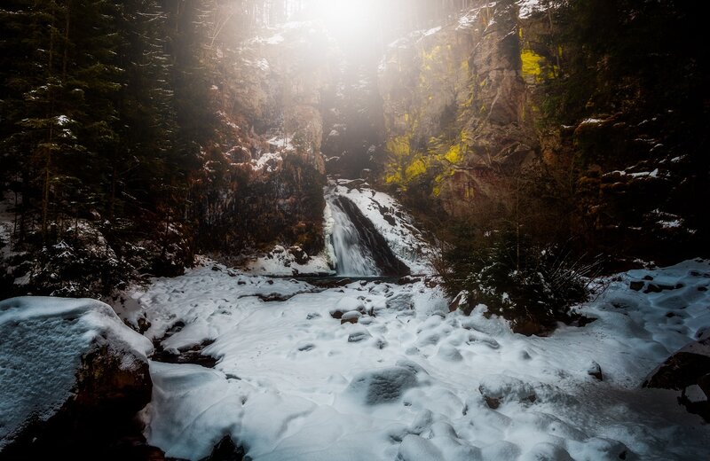 Snowy Waterfall in Forest — White, Dramatic