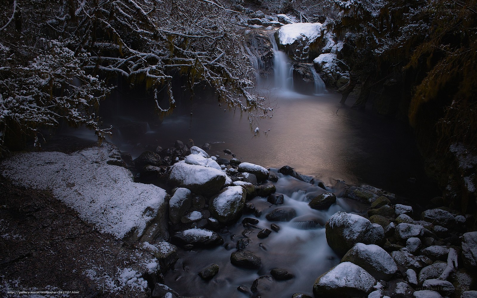 Snowy waterfall in forest