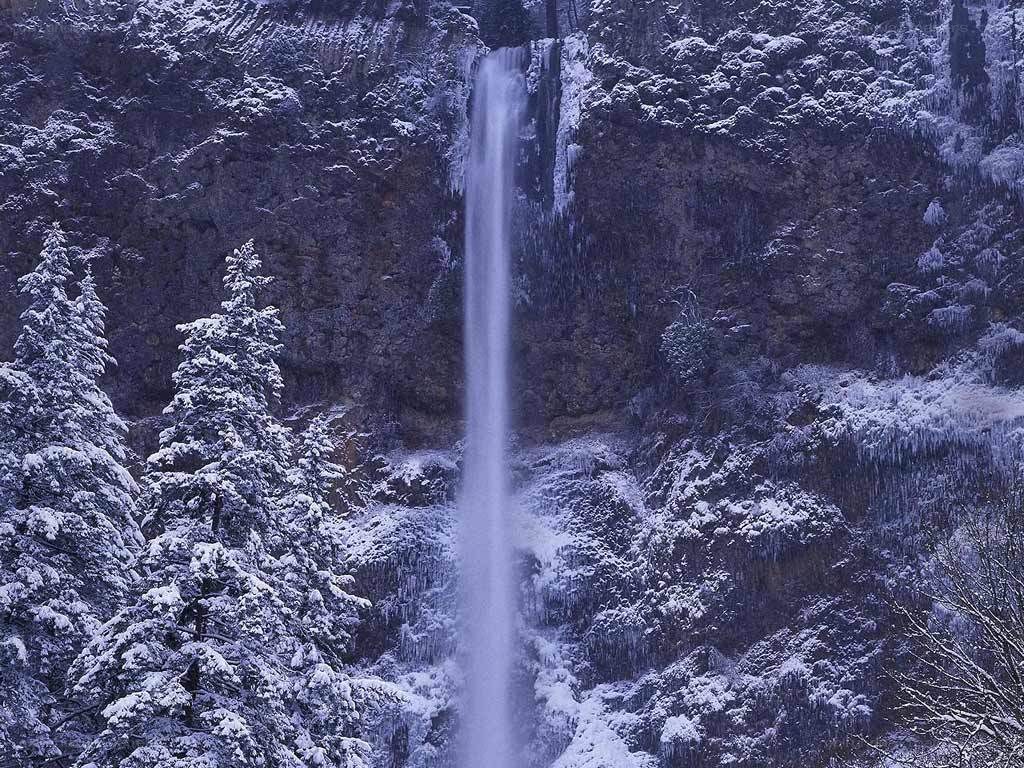 Snowy waterfall in winter