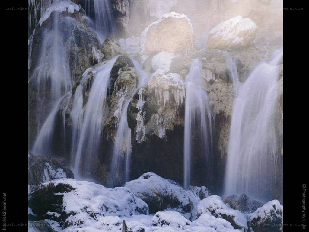 Snowy waterfall in winter
