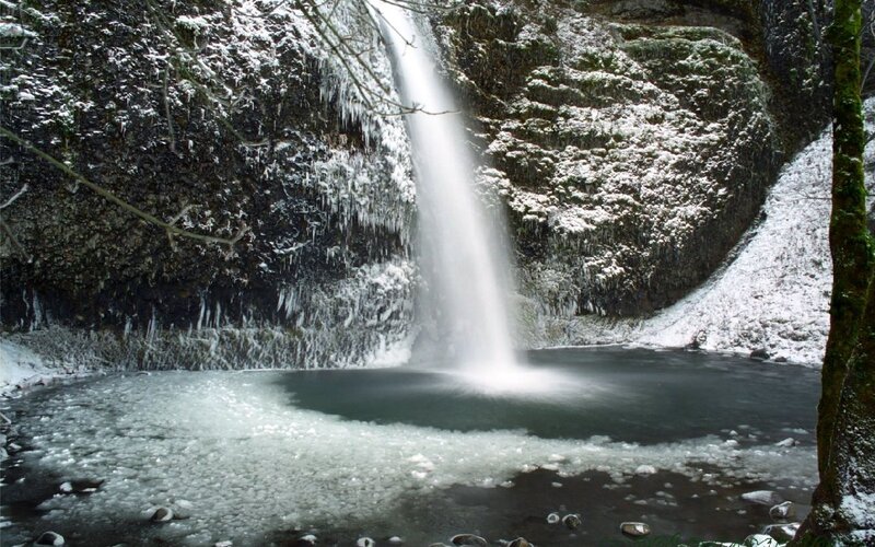 Snowy waterfall in winter