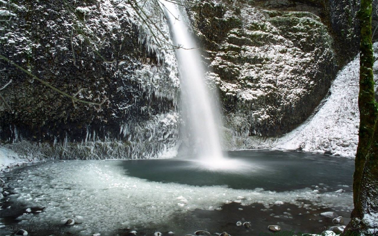 Snowy waterfall in winter