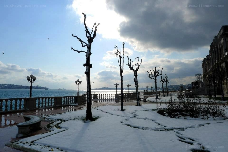 Snowy waterfront promenade